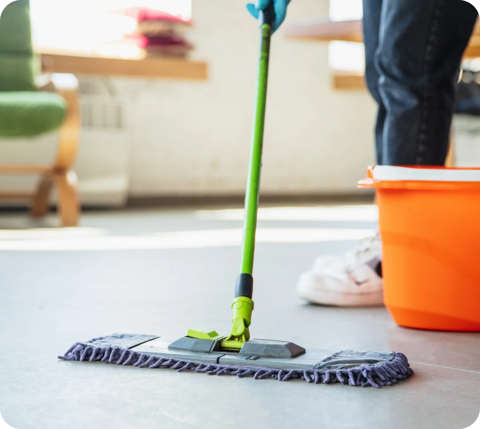 After Party Cleaning Service Brampton 1 A Person Cleaning The Floor With Mop