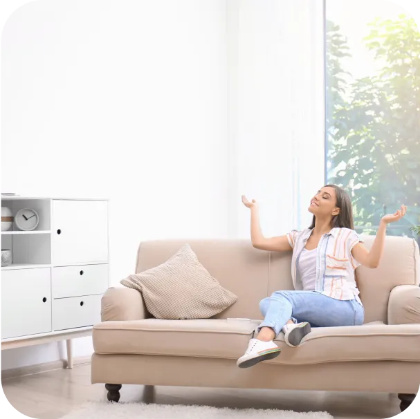 a girl feeling safe and comfortable at home after cleaning