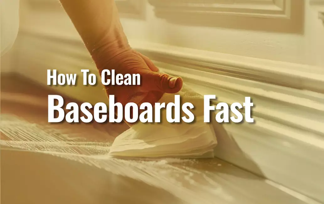 Person Cleaning White Baseboards While Standing Using An Extendable Baseboard Cleaner Tool